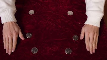 Check out Explosion (Half Dollar) by Dean Dill and LT Magic at MJMMagic.com (see link below)