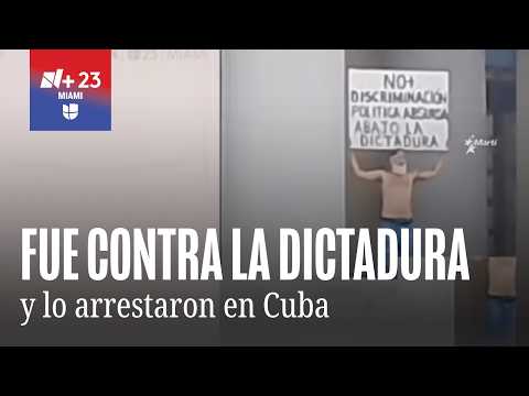 Man protesting at Havana Capitol with "down with the dictatorship" sign arrested
