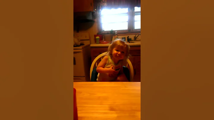 Alyssa Robb singing at the dinner table.