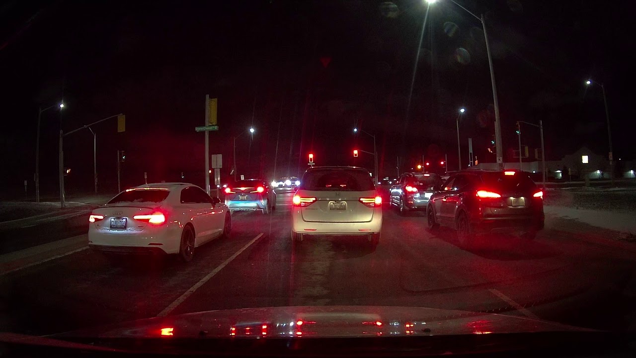 Idiot goes through red light - YouTube