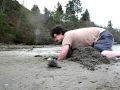 Man Digs Horse Clam with Bare Hands