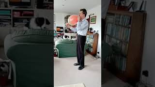 Blowing Up A Round Balloon Inside A Punch Ball Balloon