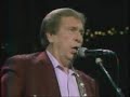 Buck owens put a quarter in the