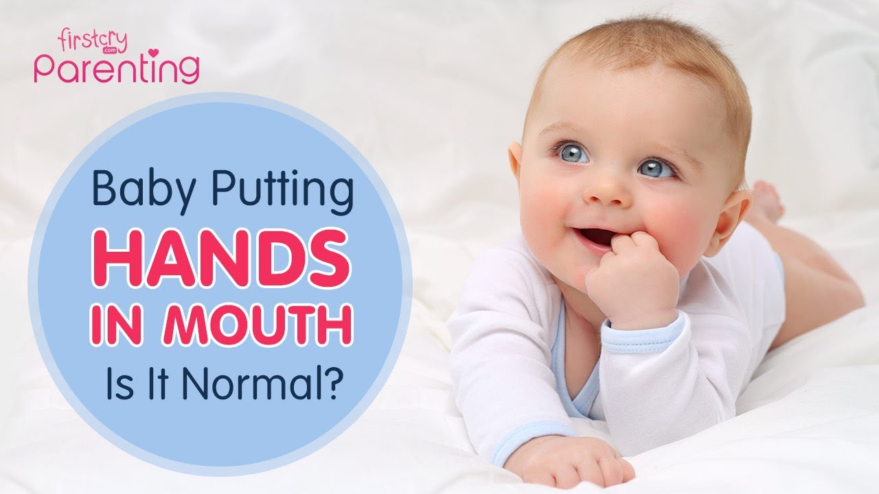 4 month old hands in mouth