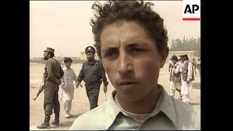 US soldiers teach Afghan children their national g...