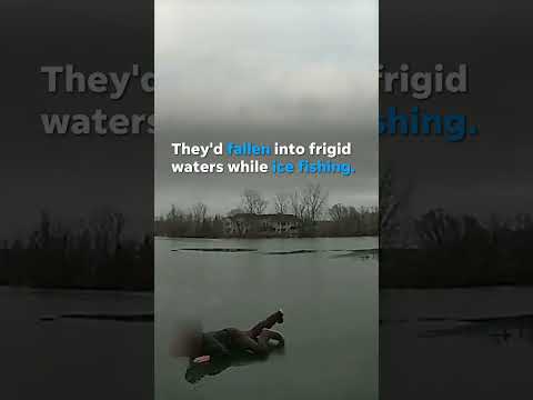 Police crawl to pull men and dog from icy lake #Shorts