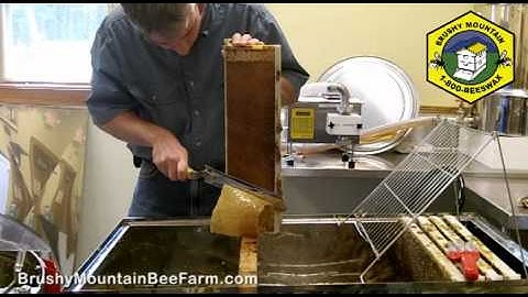 Uncapping a Frame of Honey with a Cold Knife
