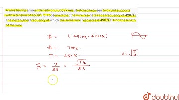 A wire having a linear density of `0.05 g//cm`is stretched between two rigid supports with a ten...