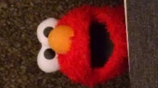 Elmo stares at you for a bit