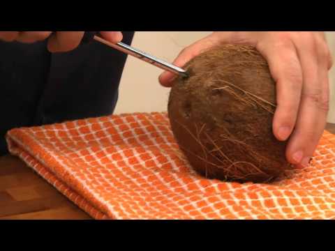 Video: How To Crack A Coconut