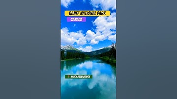 View of Rockies from Nancy Pauw Bridge over Bow River  #banffnationalpark #alberta #canada