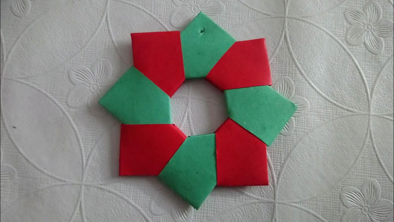 Fabriquer une étoile de Noël en origami - Evolution Classe