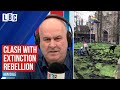 Iain Dale clashes with Extinction Rebellion protester defending digging up Trinity College
