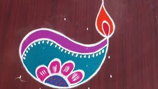 beautiful Deepam rangoli with colours @24/7 Rangoli diya muggulu rangolidesigns kolamdesigns