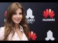 نانسي عجرم في حفل Huawei Mate 8 بفستان يظهر صدرها