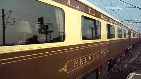 The x2 Class 57 WCRC Nos.57314+57315 with ‘The Statesman Rail’ departs at Carlisle Citadel Station.