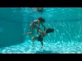 Carla underwater fighting underwater with my mom