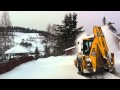 Freza de zapada pe JCB 4CX- snow blower mounted on a JCB backhoe