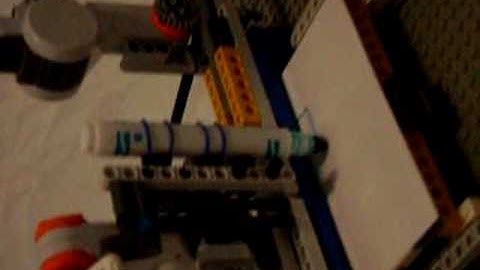 LEGO plotter robot Draws Hello.mp4