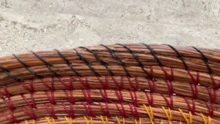 End a pine needle basket with a tapered finish