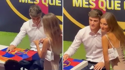 Fan appears to give Barcelona sensation Gavi her phone number during contract ceremony