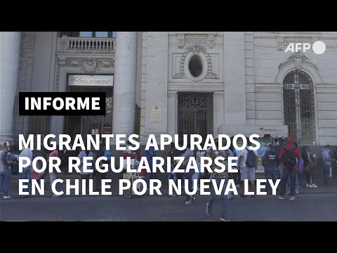 Migrantes desesperados por regularizarse en Chile ante ley que facilita expulsión | AFP