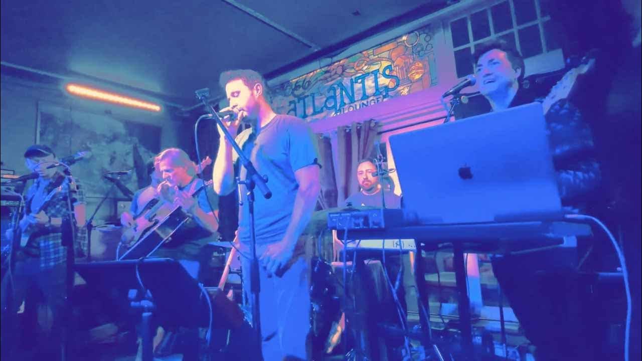 "Jigsaw Falling Into Place" performed by Portland's OK NOT OK Radiohead