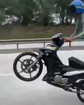 #15 Yamaha 125z wheelie,pacak video