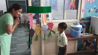 Teacher greeting her class with special handshakes \& hugs before class!!