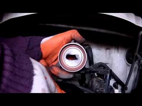 Изношенный натяжной ролик ГРМ Toyota 3S-FE / Bad Idler Pulley Sub-Assy timing belt №1 Изношенный натяжной ролик ГРМ Toyota 3S-FE / Bad Idler Pulley Sub-Assy timing belt №1