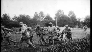 French soldiers demonstrate a 150mm mortar during World War I HD Stock Footage