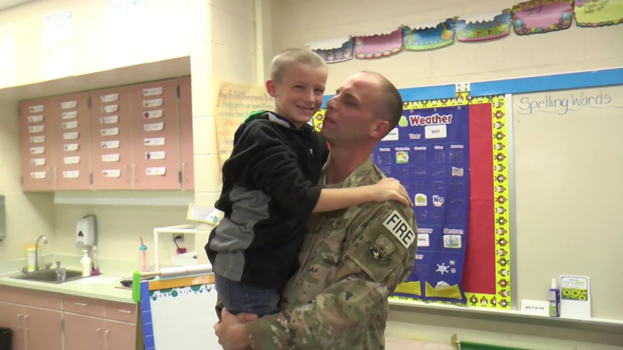 Dad Home from Deployment from Middle East Surprises Son at School