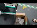 Carton box case top side flat surface adhesive label labeling machine