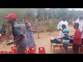 Switmaggy entertains guest as they are being served lunch at an event in Kitui