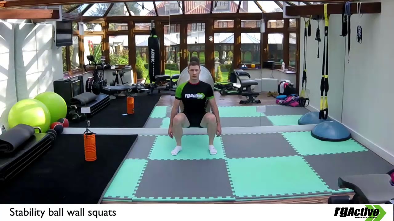 Squats - against wall with stability ball - YouTube