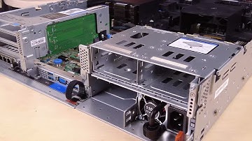 Lenovo ThinkSystem V3 2U server removing a four bay 2.5-inch rear drive backplane and drive cage