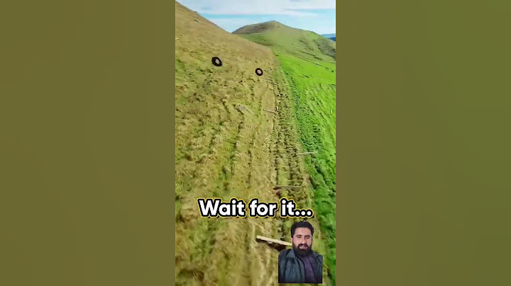 Extreme Tire Jumping Down A Mountain.😱 FPV Drone Threads The Needle!#shorts#memes