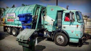 Harrison Industries - Residential Garbage Trucks - Part 1
Every month it becomes harder and harder to find Volvos, WhiteGMCs and old Peterbilts outfitted with Amrep ASLs down here in Southern California. Among the very few haulers that havent yet modernized their fleets completely are Burrtec and EJ Harrison in particular, both of which run a number of classic Amreps riding atop old Xpeditor and Peterbilt chassis.
I have made it my mission to document a good number of these trucks before they are gone, especially at EJ Harrison, a hauler out of Ventura County CA. I would say their Volvos and WhiteGMCs (diesel and LNG converted) have about a year or so left in them max, as there is a clear difference in the engine speed and revving now as compared to 4 or 5 years ago when they showed much more life.
As of now it is not clear whether or not Harrison Industries will be receiving new trucks soon, as they have a history of being slow to replace older units. They only have 2 CNG Peterbilt Octos, the newest ASLs in their fleet, but that could soon change as they did demo an N3 over the summer and seemed to like it.
The trucks featured in Part 1 are:
249 - ex-LA Peterbilt 320
205 - diesel Volvo WX-64 Amrep
237 - LNG Volvo/WhiteGMC WX-64
202 - diesel Volvo WX-64
230 - diesel Sterling Condor
Other of EJs trucks such as diesel and LNG WhiteGMCs and other Ex-LA peterbilts will likely be featured in parts 2, 3, and possibly 4 of this series. Big thanks to GarbageTruckSPSL8 for his help with routes.
Please like and comment!
Harrison Industries:: If you see anything at all wrong with the content in this video, please do not hold the driver responsible. My videos are strictly for entertainment and are not intended to get any drivers/employees in trouble. Email me with any questions or comments at socal.garbagetrucks@yahoo.com.
Video and image Copyright © 2017 SoCalGarbageTrucks. All rights reserved. Please ask me before using/embedding my video/image. Harrison Industries - Residential Garbage Trucks - Part 1
