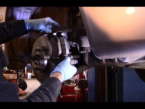 How to replace front brakes and rotors on a Toyota Corolla - YouTube