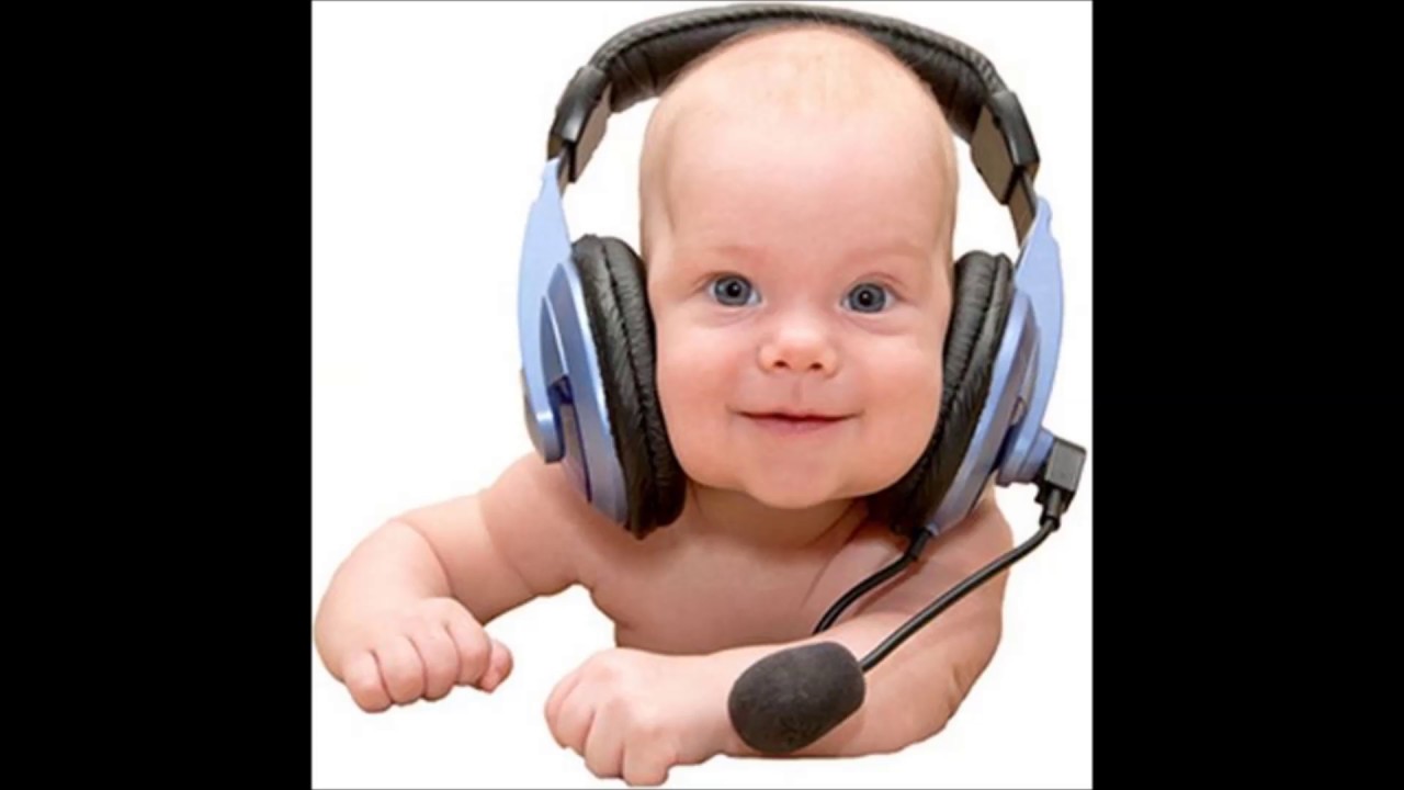 Baby voice. Baby holding a Doctors Headset.
