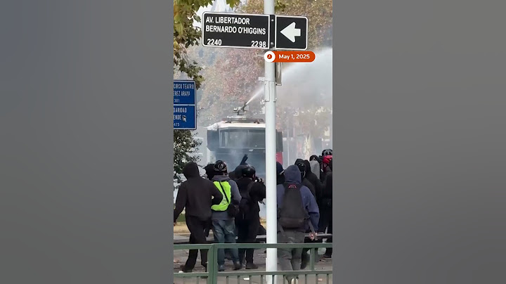 Chilean police disperse May Day protesters with water cannons | REUTERS