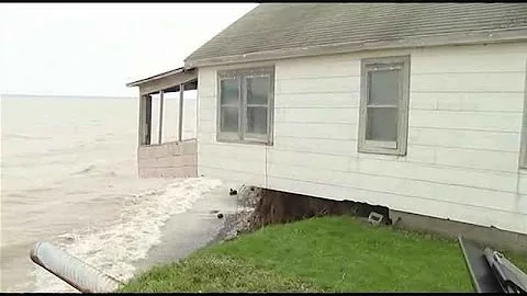 Wolcott home hangs over eroded shoreline