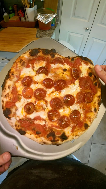 GUESS WHY THIS PEPPERONI PIZZA IS MISSHAPEN #pizza #asmr #cooking #food #shorts #sourdough
