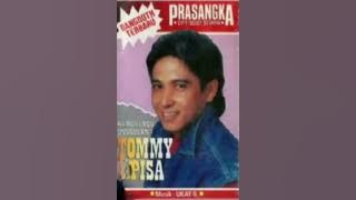 prasangka _ Tomy J Pisa