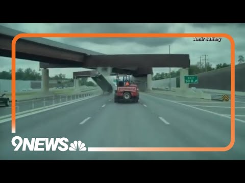 Dump truck with raised bed hits overpass