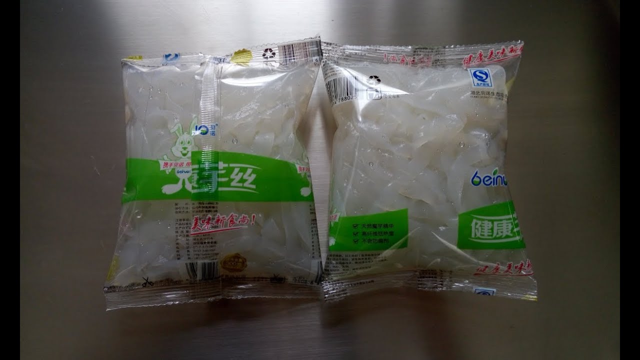 Horizontal flow wrap machine to pack rice noodle