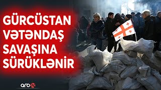 Qərbin Gürcüstandakı QHT-lərə etdiyi "yatırım"lar puç oldu: "Rus qanunu" ölkəni ikiyə böldü