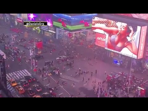 Backfiring motorcycle causes panic at Times Square in New York