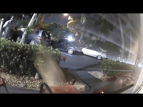 Rough delivery by postal worker tossing packages caught on camera