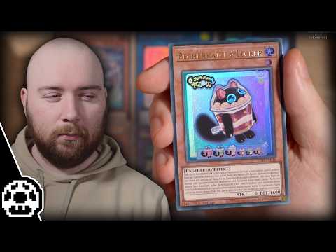 Mogi packt aktuelle Yu-Gi-Oh Karten aus.